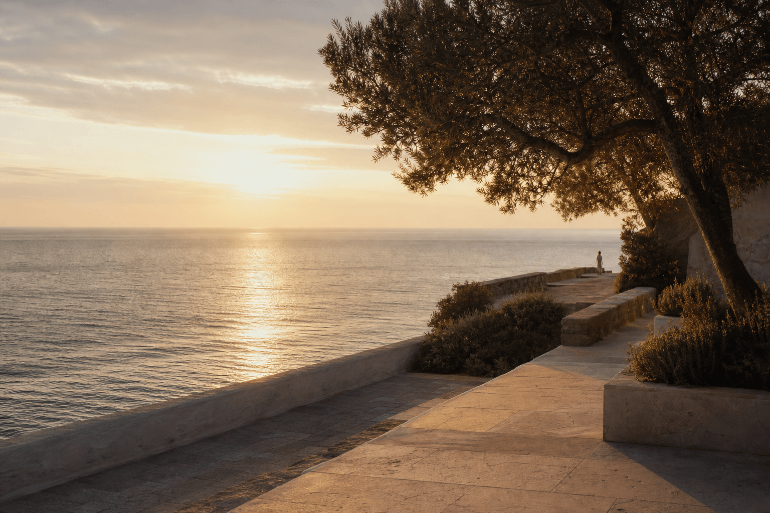 A resort terrace above the Aegean at golden hour